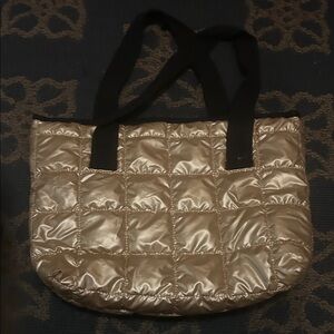 Quilted puffer Gold Tote Bag with zipper closure and black straps